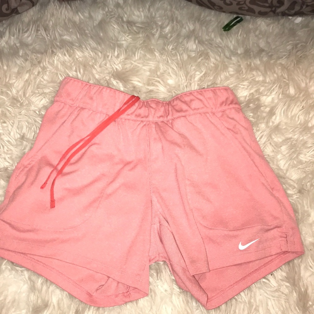 Pink nike running shorts